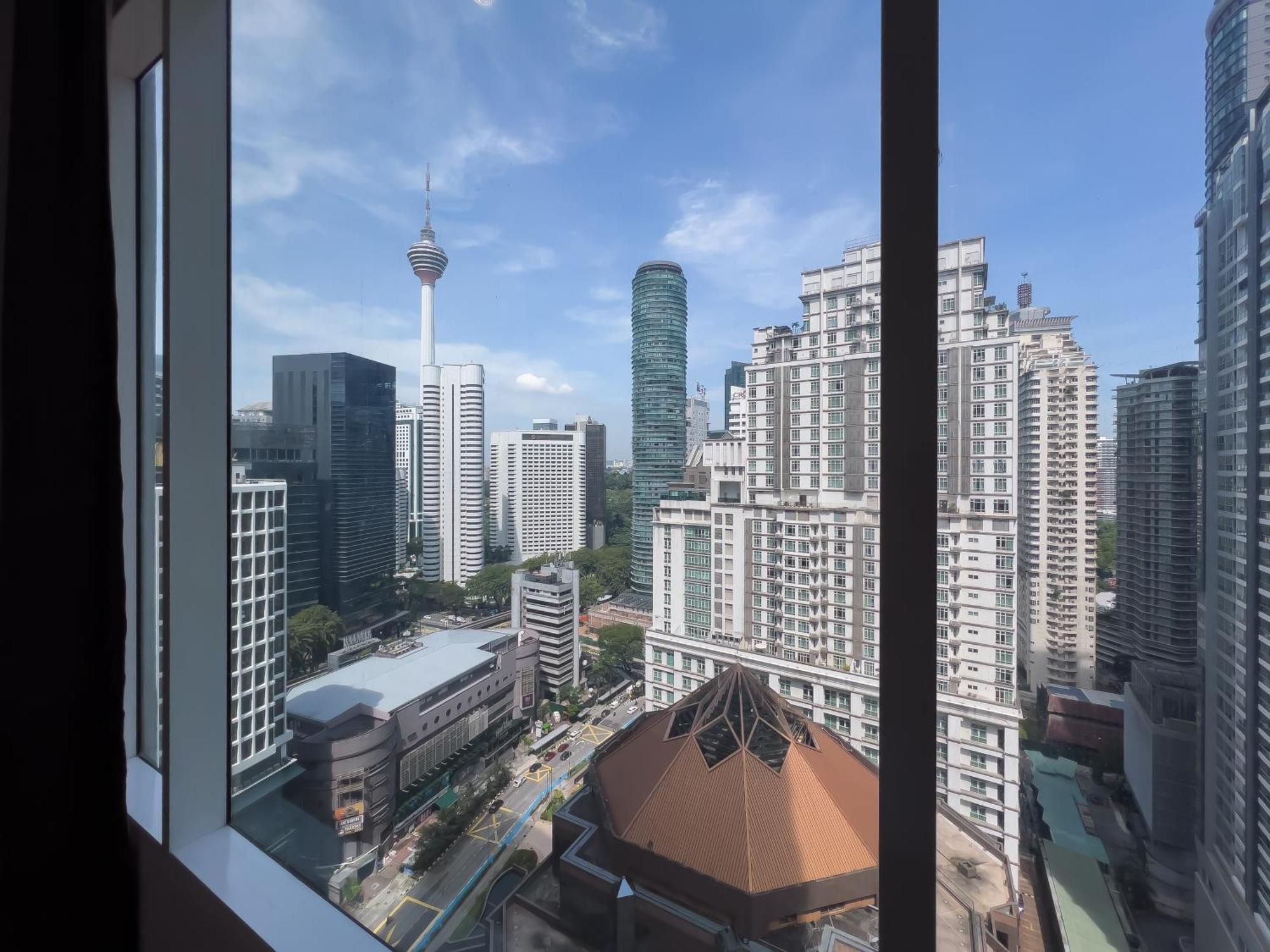 Soho Suites Klcc By Guesthouse Куала-Лумпур Экстерьер фото